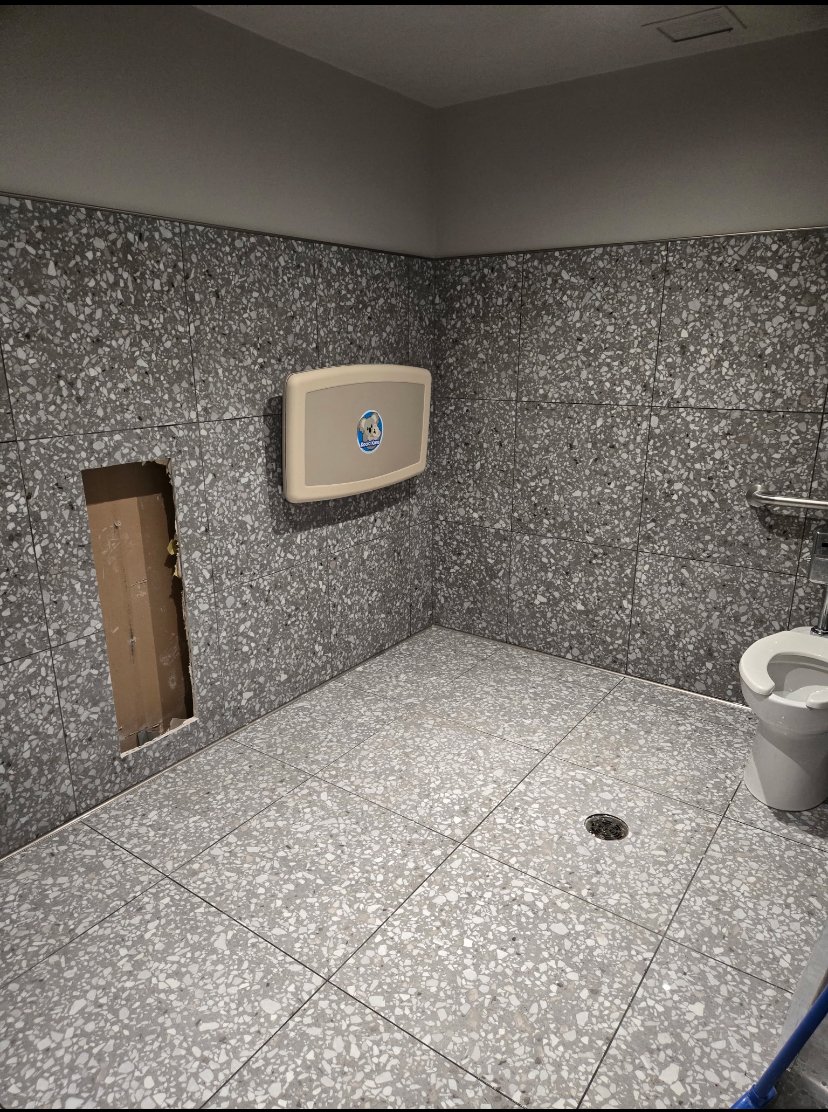 Tim Hortons washroom wall and floor detail after cleaning